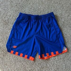 New Balance athletic shorts. EUC. Pockets. Elastic waist. Size Large.